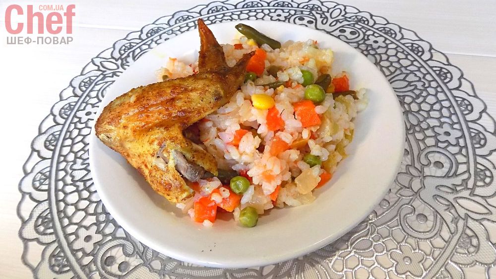 Курица приготовленная в духовке с гарниром из овощей и риса